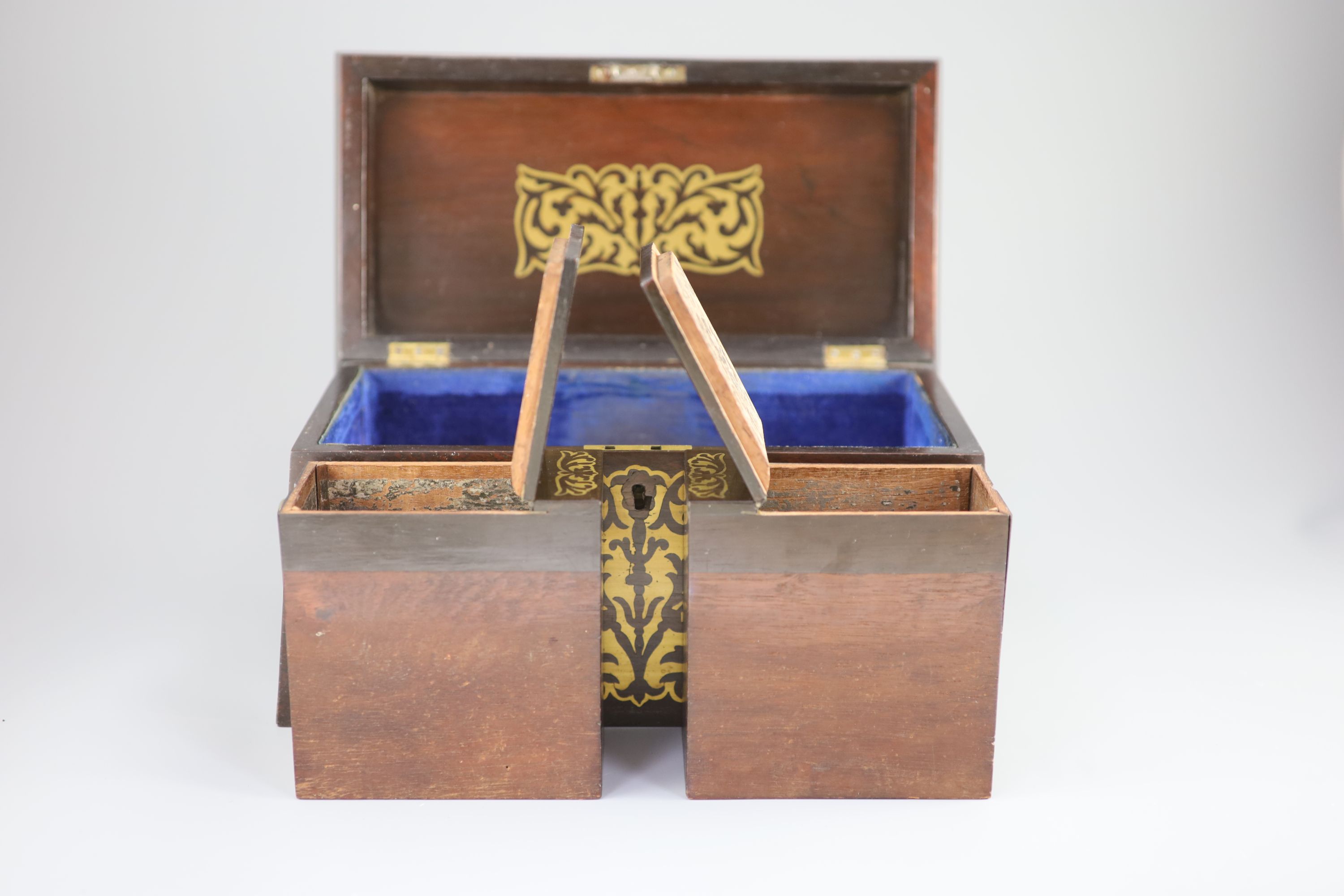 An early 19th century brass inlaid rosewood tea caddy in the boulle manner, 33 x 18cm, 18cm high.